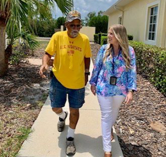 Veteran and Coach walking together